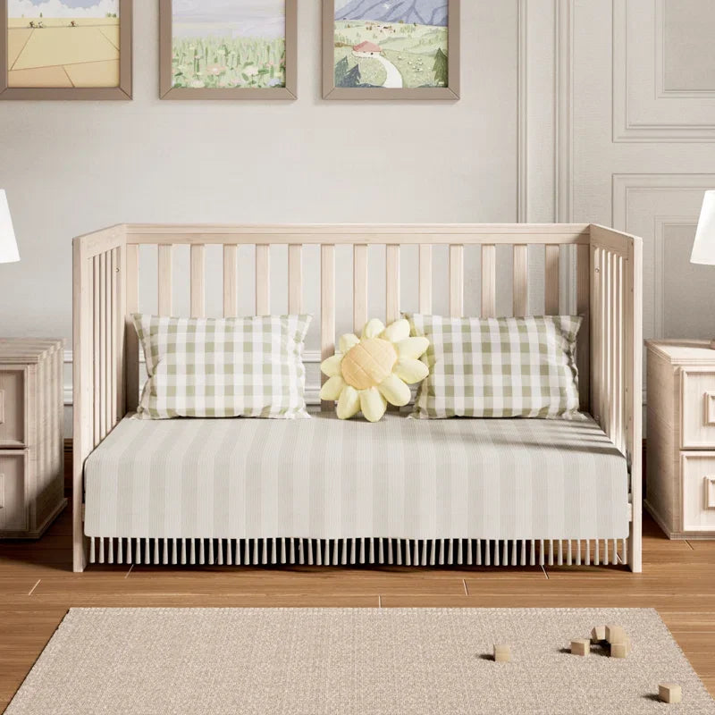 11-in-1 Convertible Baby Crib With Removable Wheels.