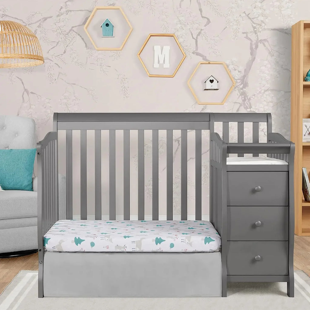 4‑in‑1 Convertible Baby Crib & Changer with Storage.