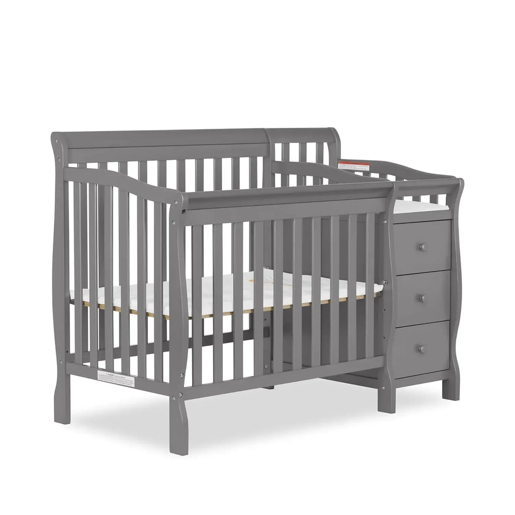 4‑in‑1 Convertible Baby Crib & Changer with Storage.